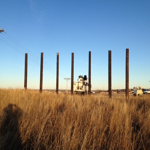 Setting poles for billboard in laurel mt