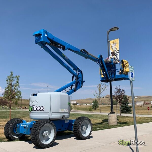 Installing Pole Banners for Schools in Gillette WY